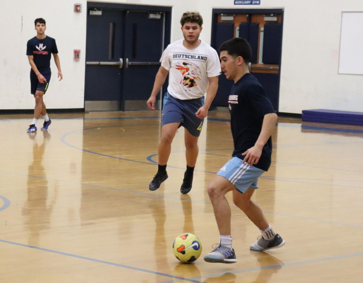 Senior Izzack Cruz Gonaglez looks to make a pass.