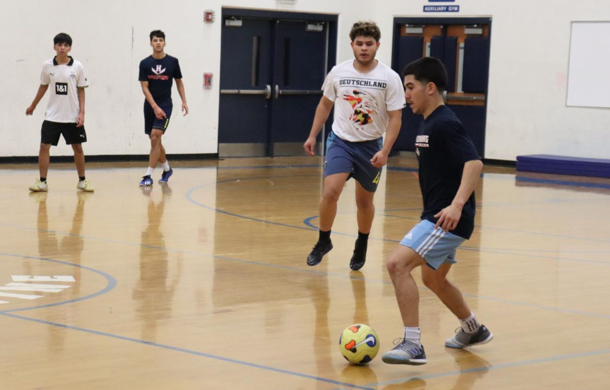 Senior Izaack Cruz Gonzalez looks to make a pass
