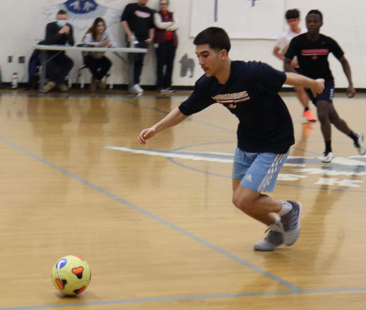 Senior Izzack Cruz Gonaglez tries to get the ball.