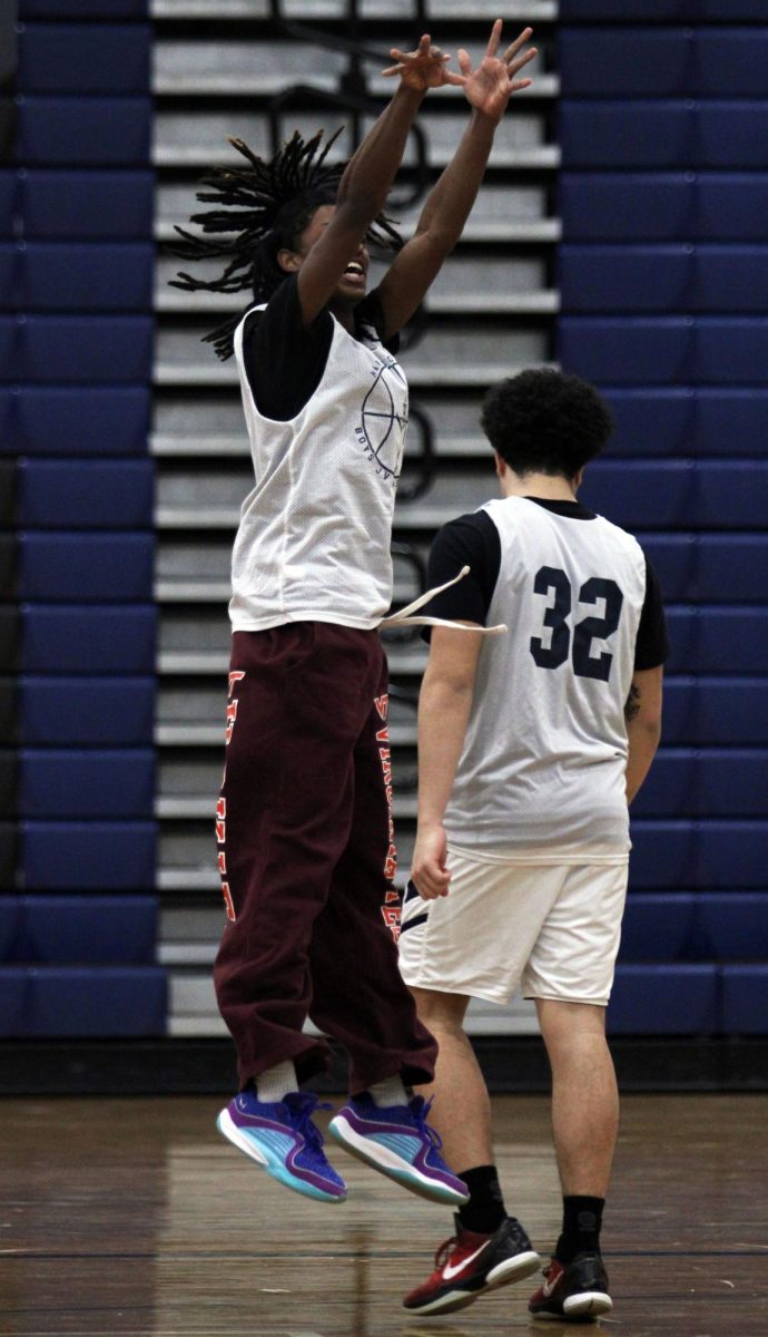 The HHS Varsity Boys Basketball team is shown practicing free throws, a shooting drill and running plays before there game. Sophomore Yandel Robles was nominated earlier this week for 1st team all valley district. "I'm so grateful for all of my friends and family members support this season. I feel like we could've done better, but it was a good season" Yandel Robles said.