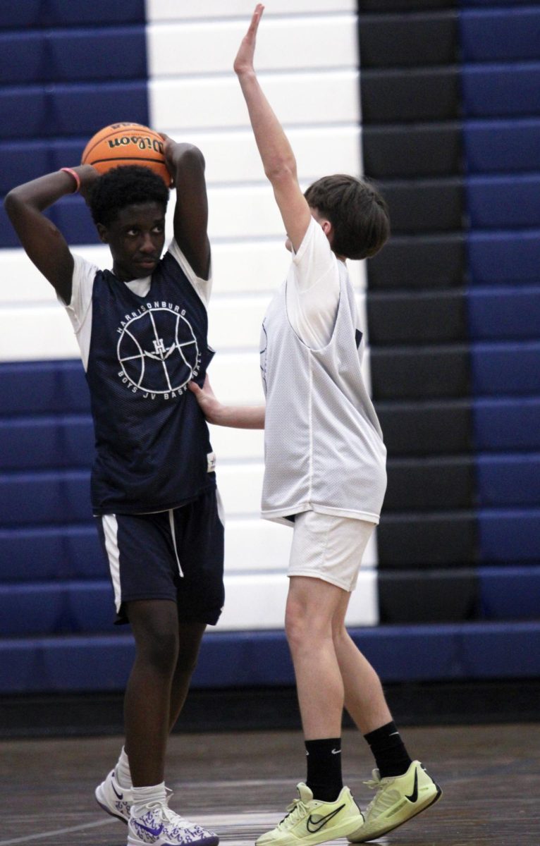 The JV Boys Basketball team is shown practicing before a game against William Monroe High School. Throughout these photos you can see these players hustling up and Down the court getting ready for their upcoming game. "One of the major things we spend some time on in practice are free throws because even if you miss just one, it can cost you the whole game", said John Lichti.  The Jv boys are working very hard as shown in the photos hoping to secure the victory in their upcoming game.#Bluestreakpride#HHSmediaLC
