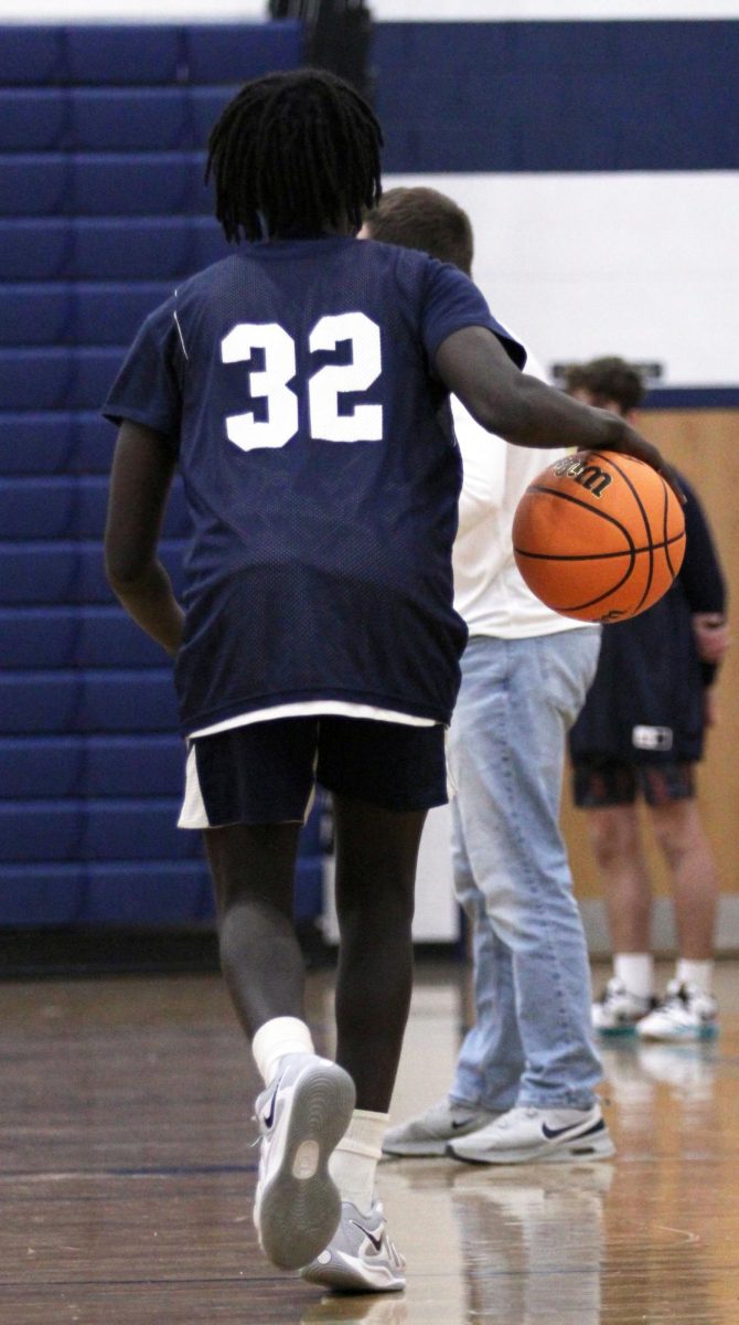 The JV Boys Basketball team is shown practicing before a game against William Monroe High School. Throughout these photos you can see these players hustling up and Down the court getting ready for their upcoming game. "One of the major things we spend some time on in practice are free throws because even if you miss just one, it can cost you the whole game", said John Lichti.  The Jv boys are working very hard as shown in the photos hoping to secure the victory in their upcoming game.#Bluestreakpride#HHSmediaLC