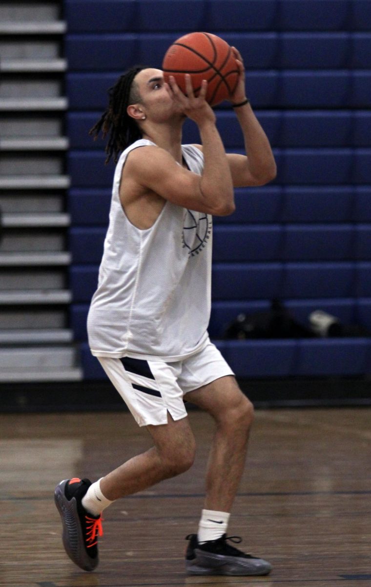 The HHS Varsity Boys Basketball team is shown practicing free throws, a shooting drill and running plays before there game. Sophomore Yandel Robles was nominated earlier this week for 1st team all valley district. "I'm so grateful for all of my friends and family members support this season. I feel like we could've done better, but it was a good season" Yandel Robles said.