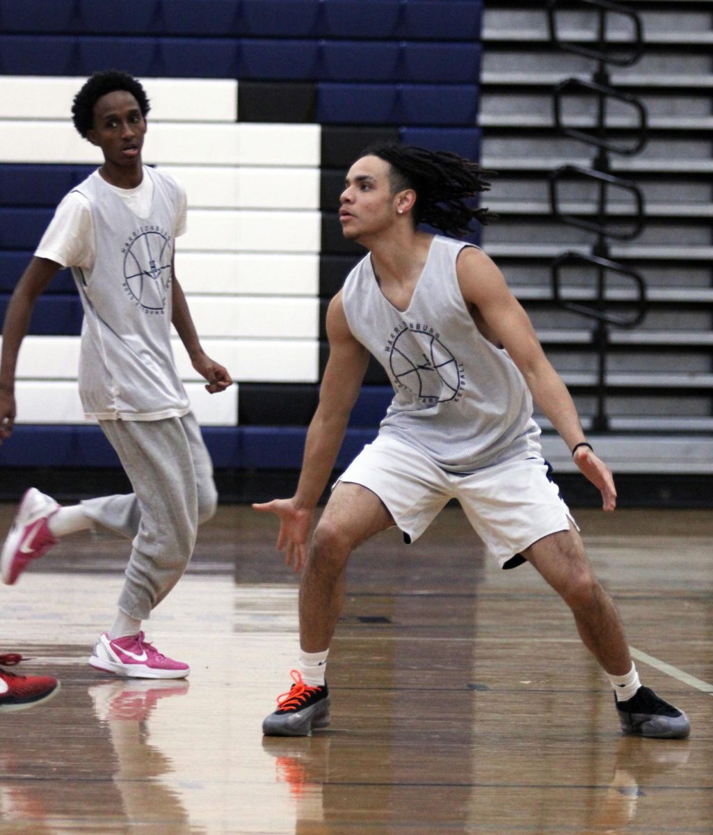 The HHS Varsity Boys Basketball team is shown practicing free throws, a shooting drill and running plays before there game. Sophomore Yandel Robles was nominated earlier this week for 1st team all valley district. "I'm so grateful for all of my friends and family members support this season. I feel like we could've done better, but it was a good season" Yandel Robles said.