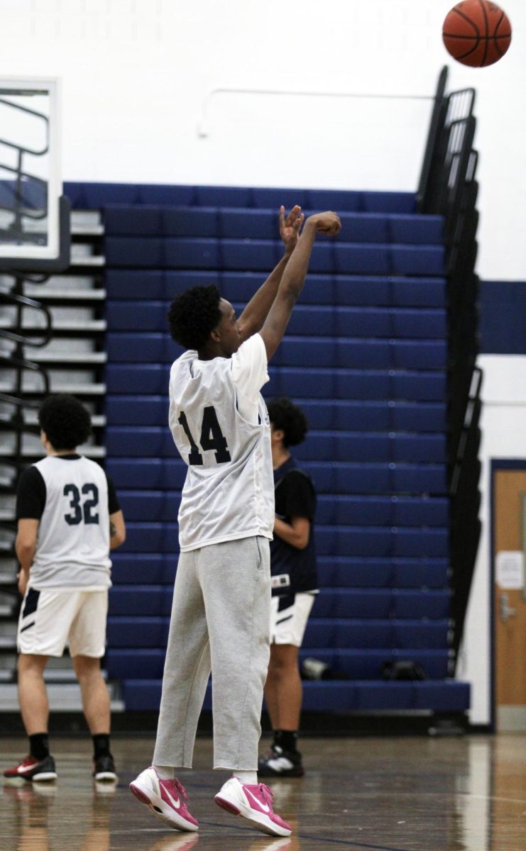 The HHS Varsity Boys Basketball team is shown practicing free throws, a shooting drill and running plays before there game. Sophomore Yandel Robles was nominated earlier this week for 1st team all valley district. "I'm so grateful for all of my friends and family members support this season. I feel like we could've done better, but it was a good season" Yandel Robles said.