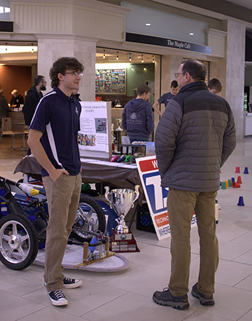 Senior Davis Bert talking about EV Grand Prix.
