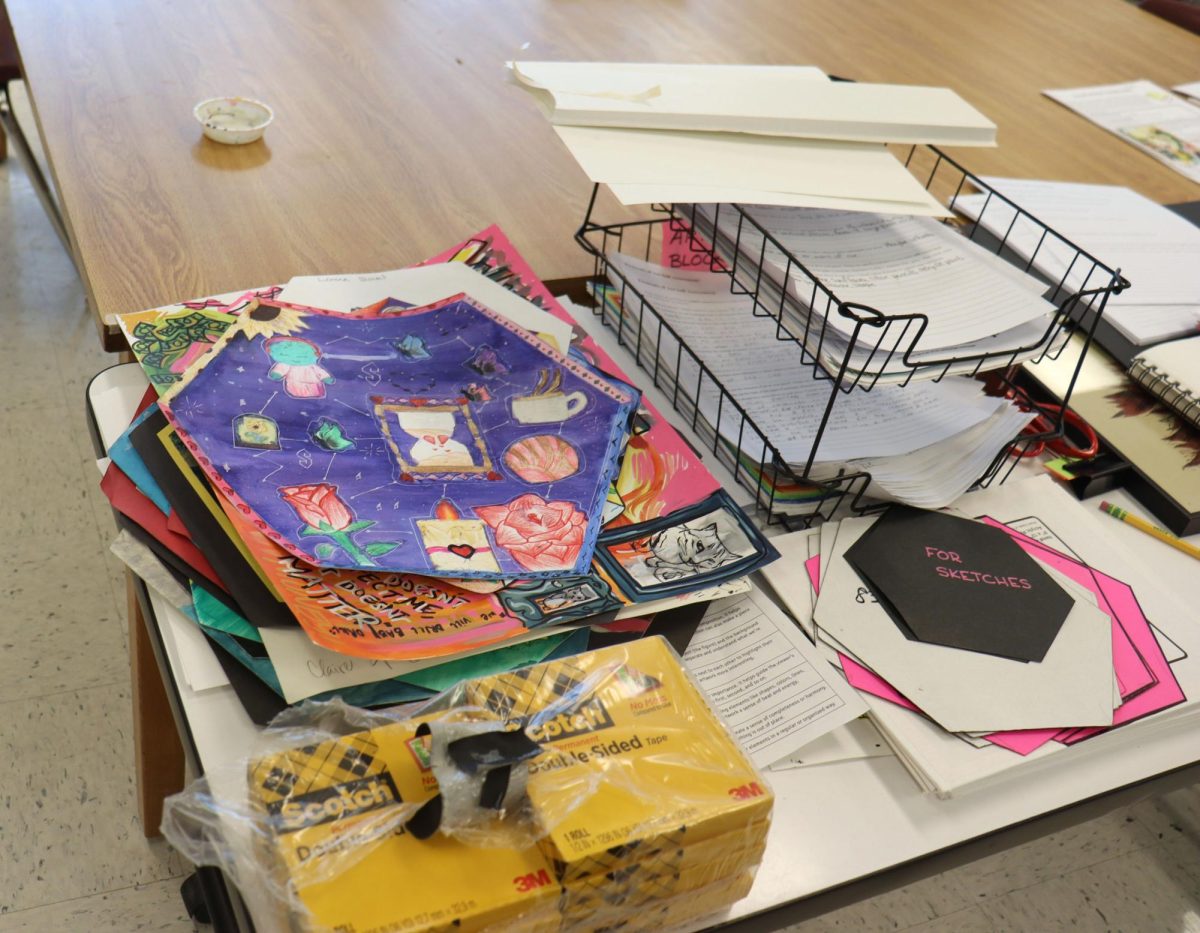 Every time a student is finished with their projects, they put the projects in a stack up in front of the room. Then the teacher offers that if a student would like to show off their project in an event, they put their project in a separate pile. If the student chose not to show their project, they put the projects in a different pile.