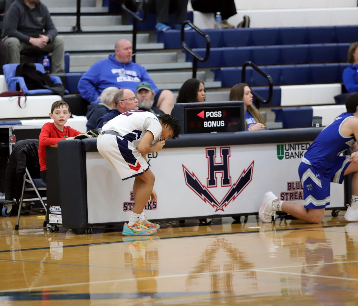 William getting ready to switch with someone in the court