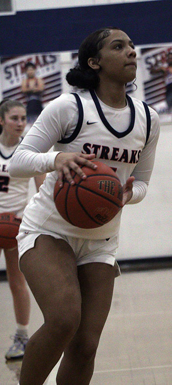 Alyse Sheffy prepares to shoot.