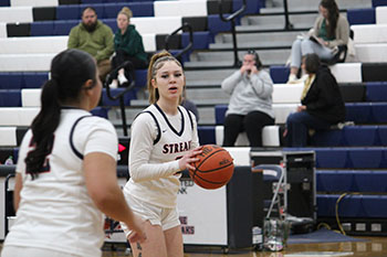 Sophomore Sierra Cain playing at HHS's last basketball game " We were all hyped because it was senior night and we kept scoring," Sierra had mentioned.