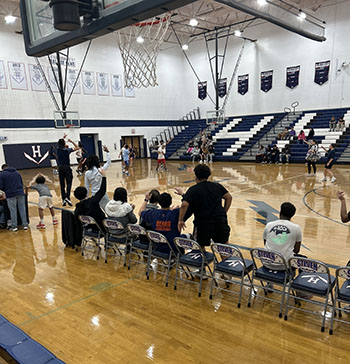 Bench players cheering on students