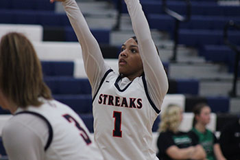 Sophomore Alyse Sheffey is shooting her free shot throw.