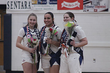 Seniors Kayli Alvarado, McKenna Dayton, and Lily Rupe get a lot of support for senior night.