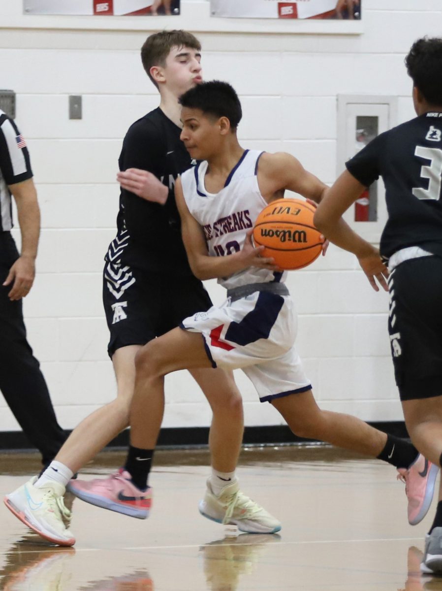 Sophomore Daniel Turcios Maradiaga dogging an opponent