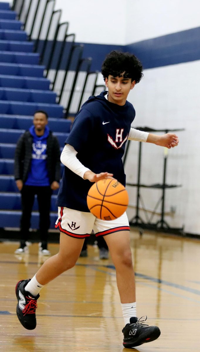 Sophomore Hazhir Qadir dribbling the ball 