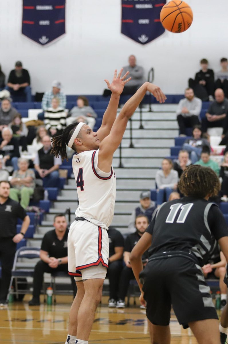 Senior Lazaro Valdivia shooting a free throw.