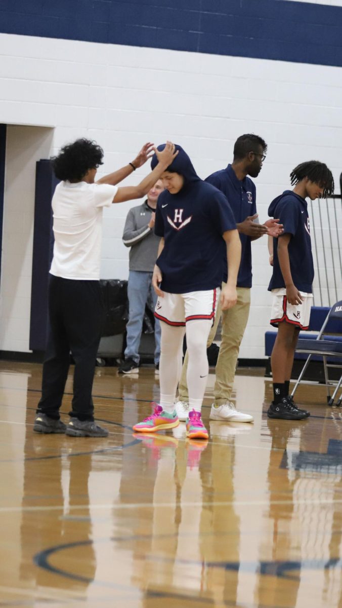 Robles getting crowned to start the game  