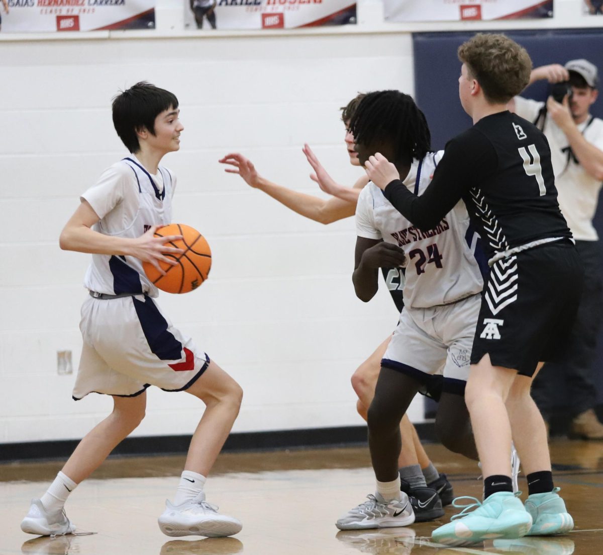 Freshman John Litchti trying to pass the ball
