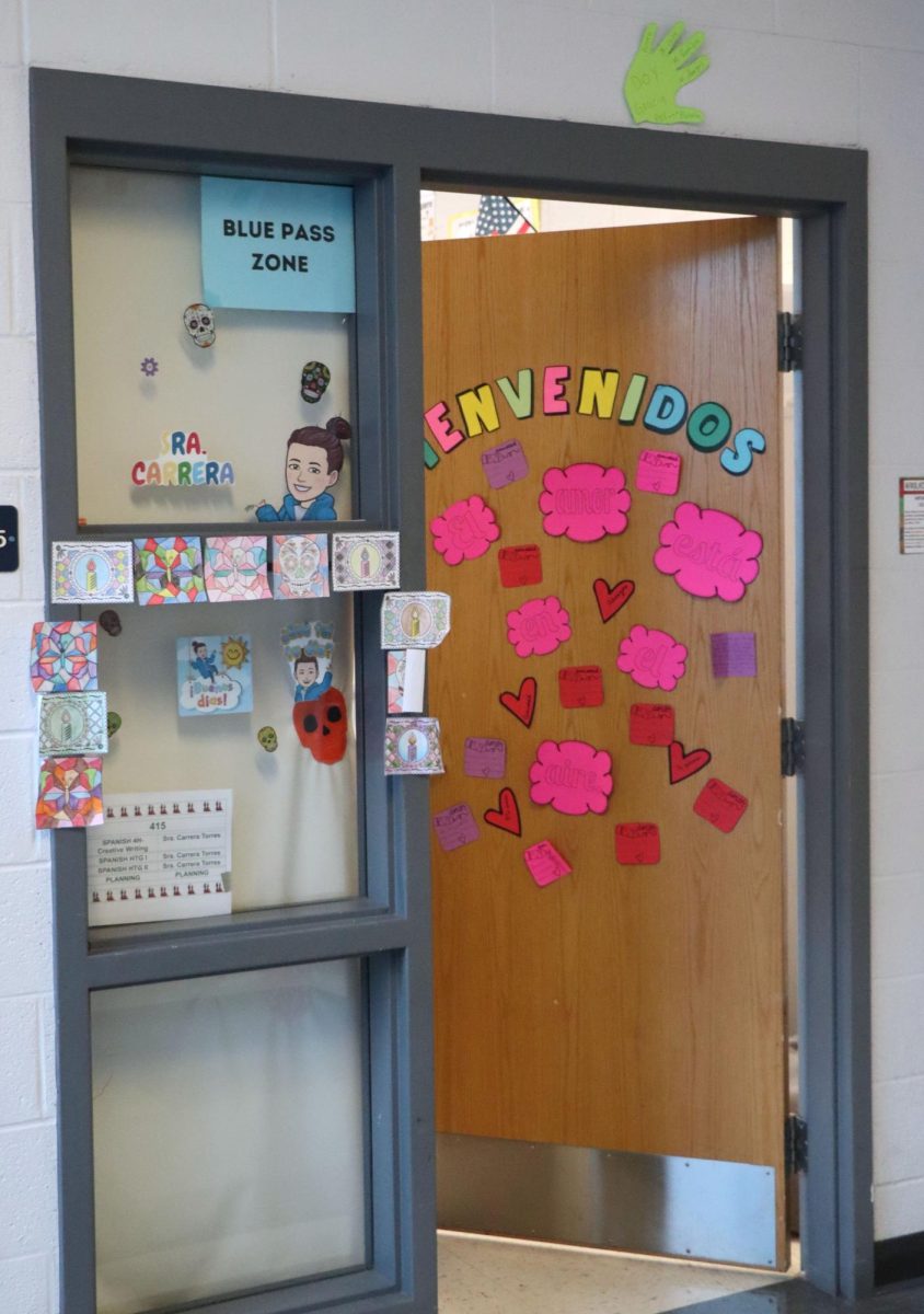 Lastly, Sra. Carrera’s classroom at Harrisonburg High is popular among students. The creatively decorated door, adorned with hearts and bright colors, invites them in. It is usually left slightly ajar to prevent anyone from getting locked out.