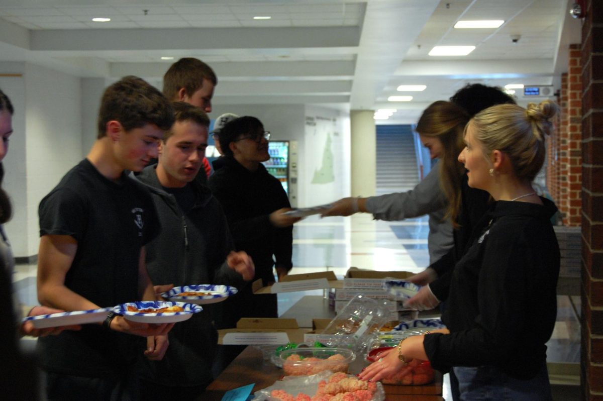 Senior Joshua Nafziger chooses pizza to eat.