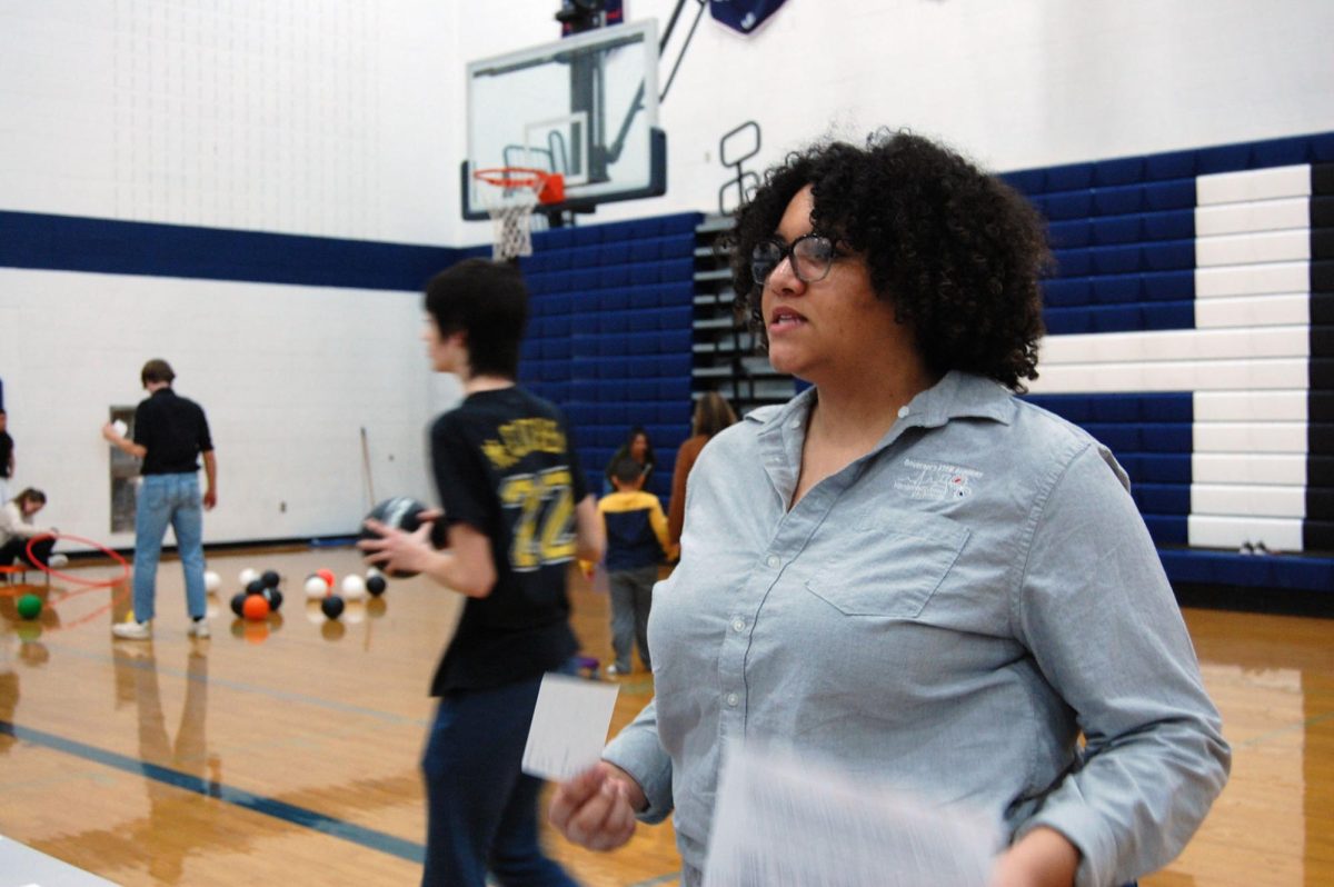 Senior Addison Mason explains activity.
