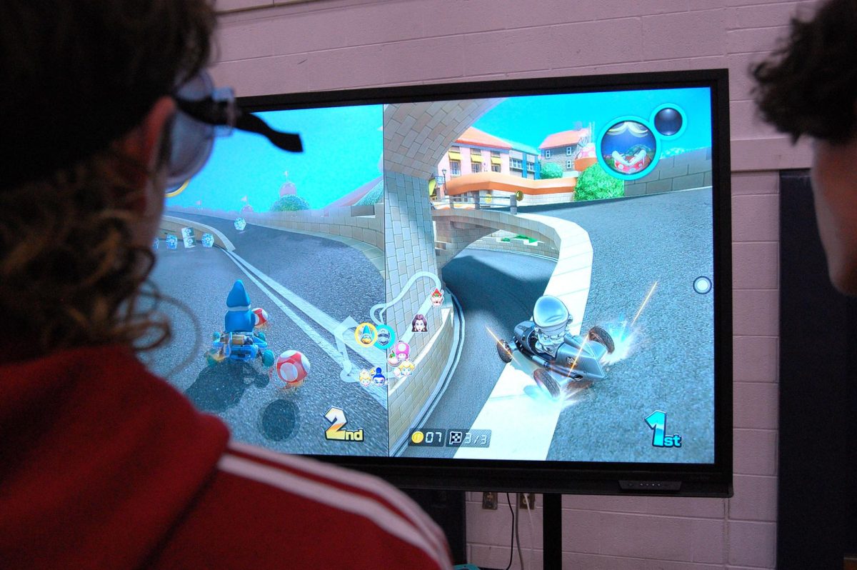 Sophomore Wesley Swartz races in Mario cart with drunk goggles.