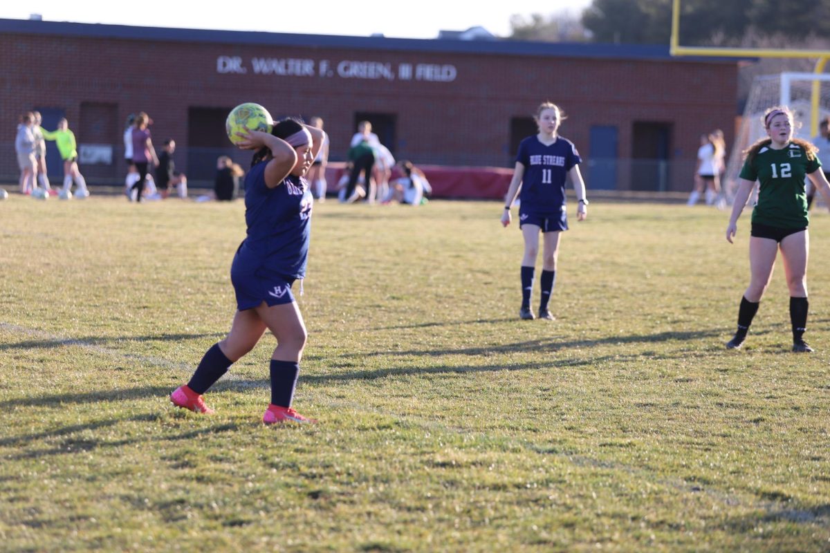 Freshman Gabriela Guare-Bustamante prepares to throw in the ball. 