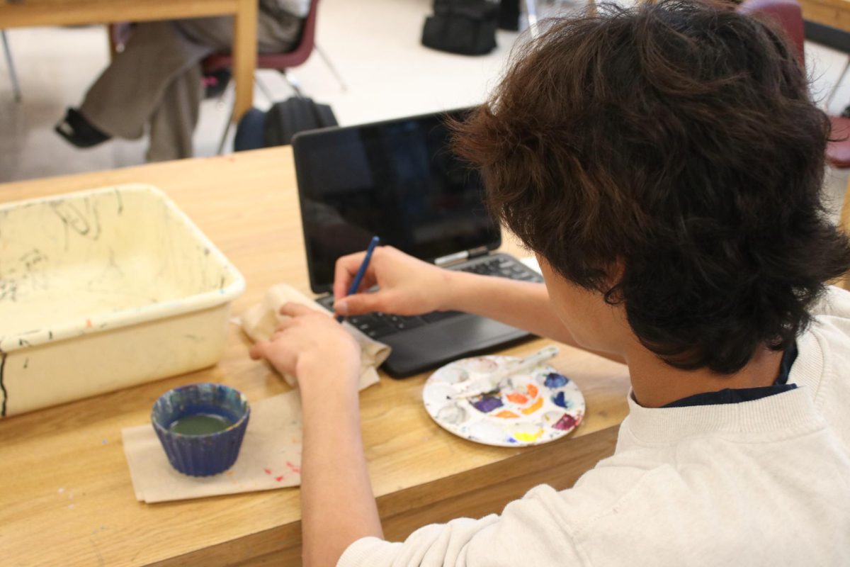 Student making art 