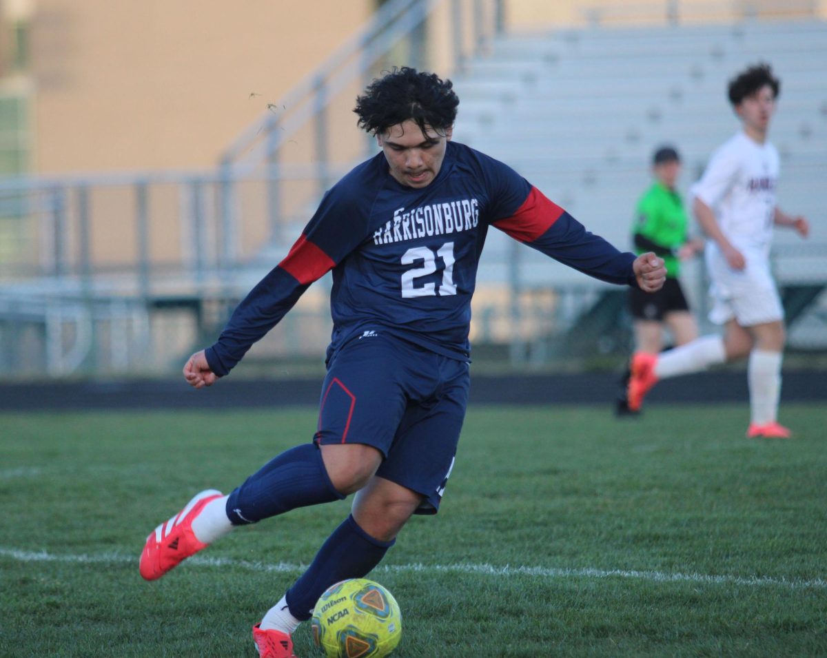 Sophomore Jeferson Rivera Mazariegos kicks the ball.