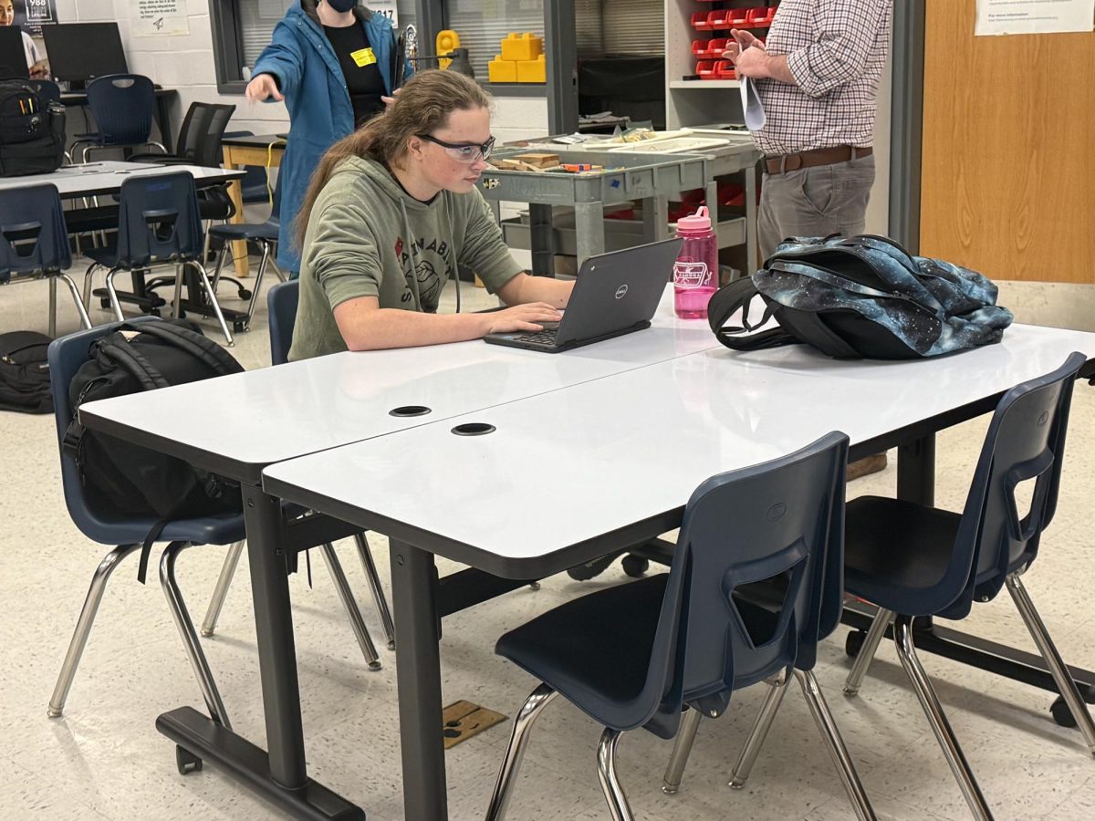 Sophomore Alonzo works on computer
