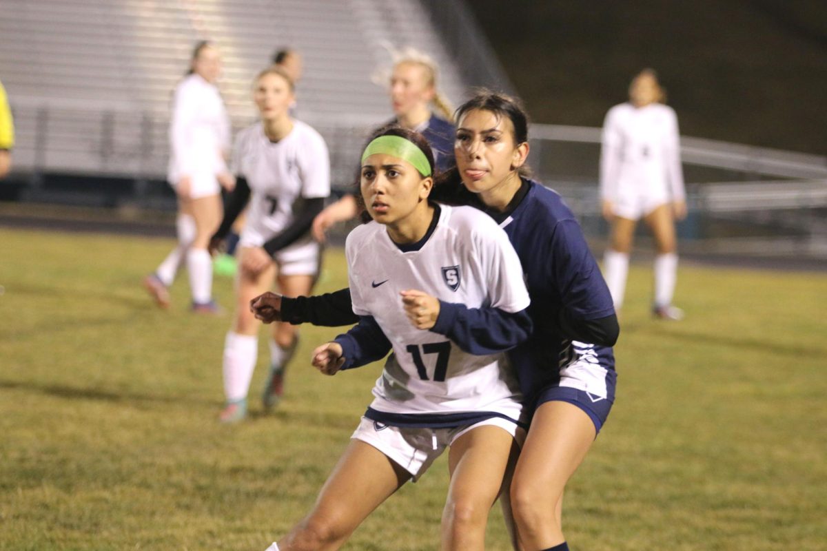 Irias plays defense at scrimmage.