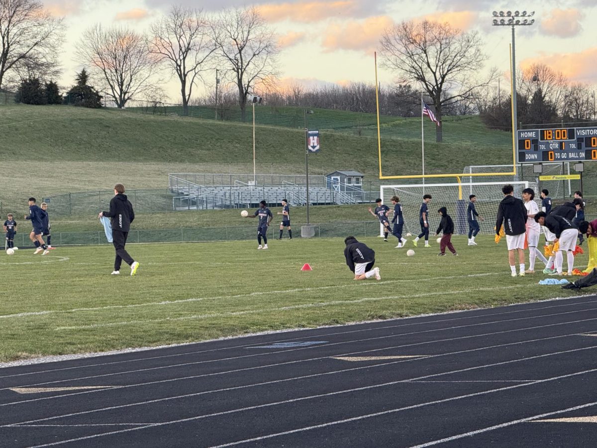 Players on soccer field