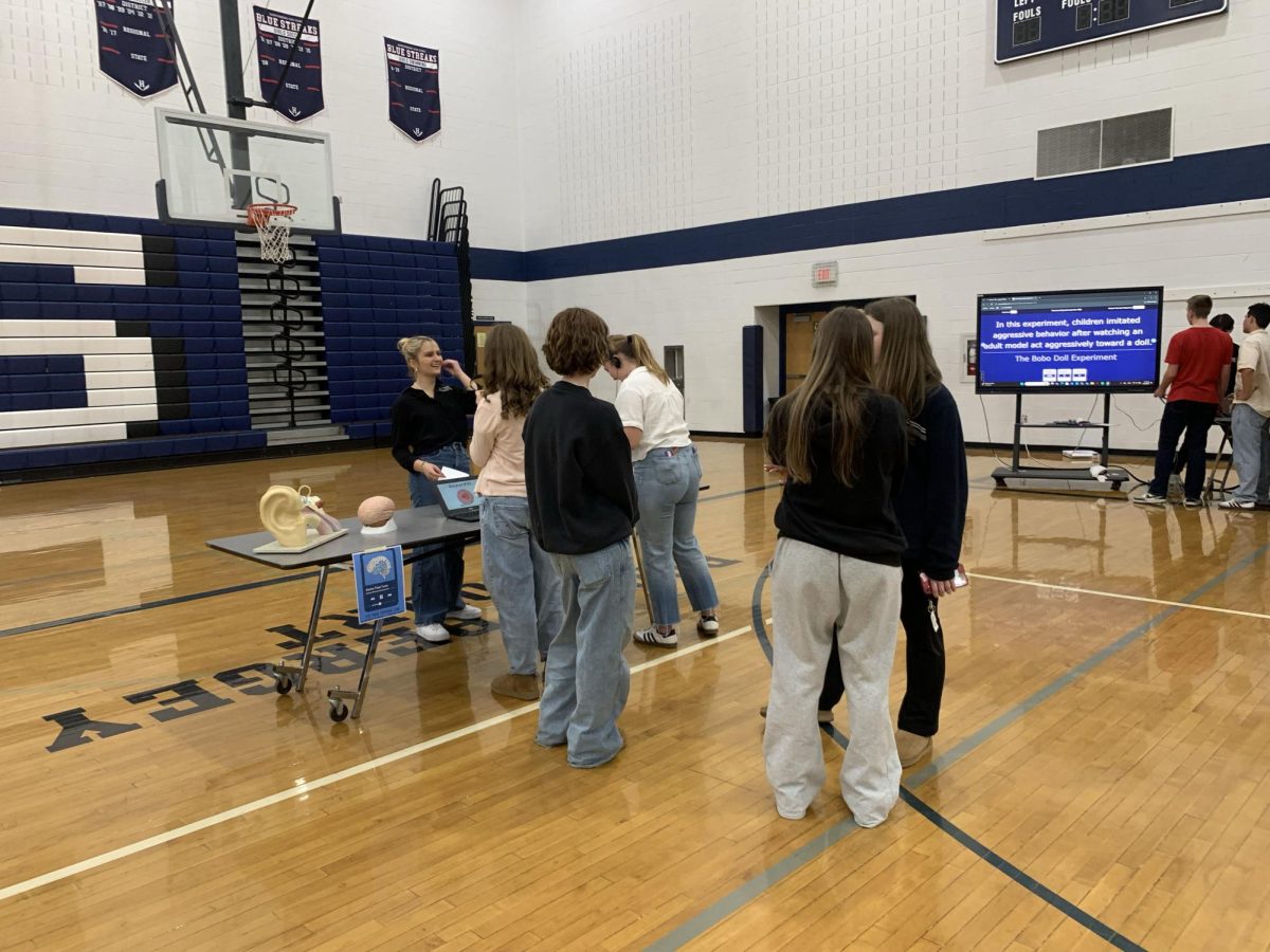 Students waiting in line for an activity. 