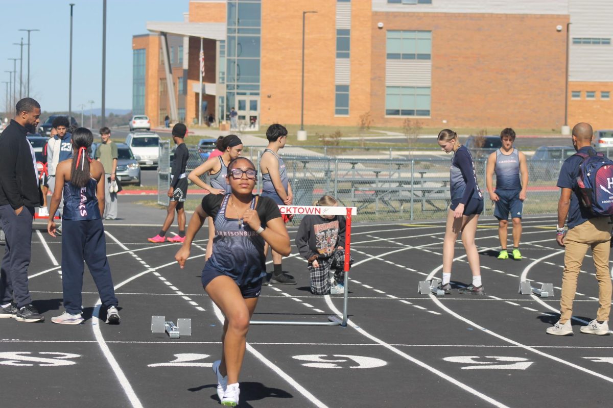 Sophomore Zavaya Wright practices 100m block starts.