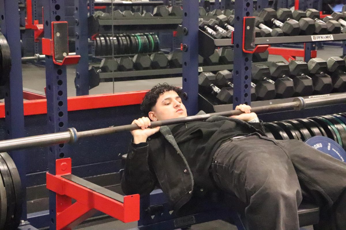 Focused and determined, Christian Martinez is pushing their limits in weight training class, building strength, discipline, and resilience with every rep. Each set is a step closer to their fitness goals, proving that hard work and consistency pays off. 
