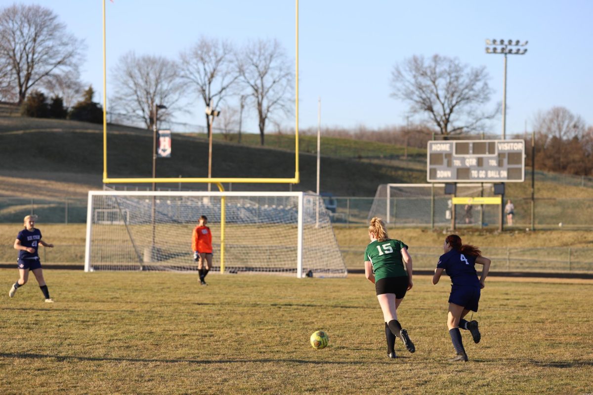 Freshman Escarlen Ayala Bonilla runs towards the ball to score her team a point. 