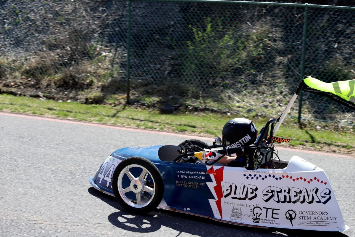 Sophomore Elio Cortina speeds around the track.