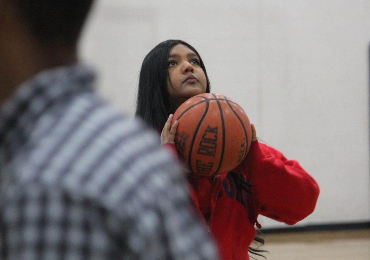 Freshman Shakirah Hassankhan shoots the basketball