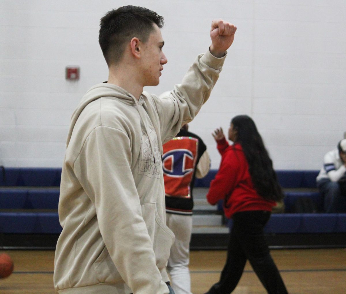 Freshman Victor Jimenez-Khashchuk celebrates after making a shot
