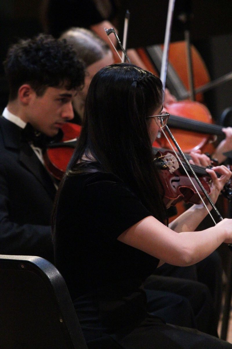 Student playing violin 