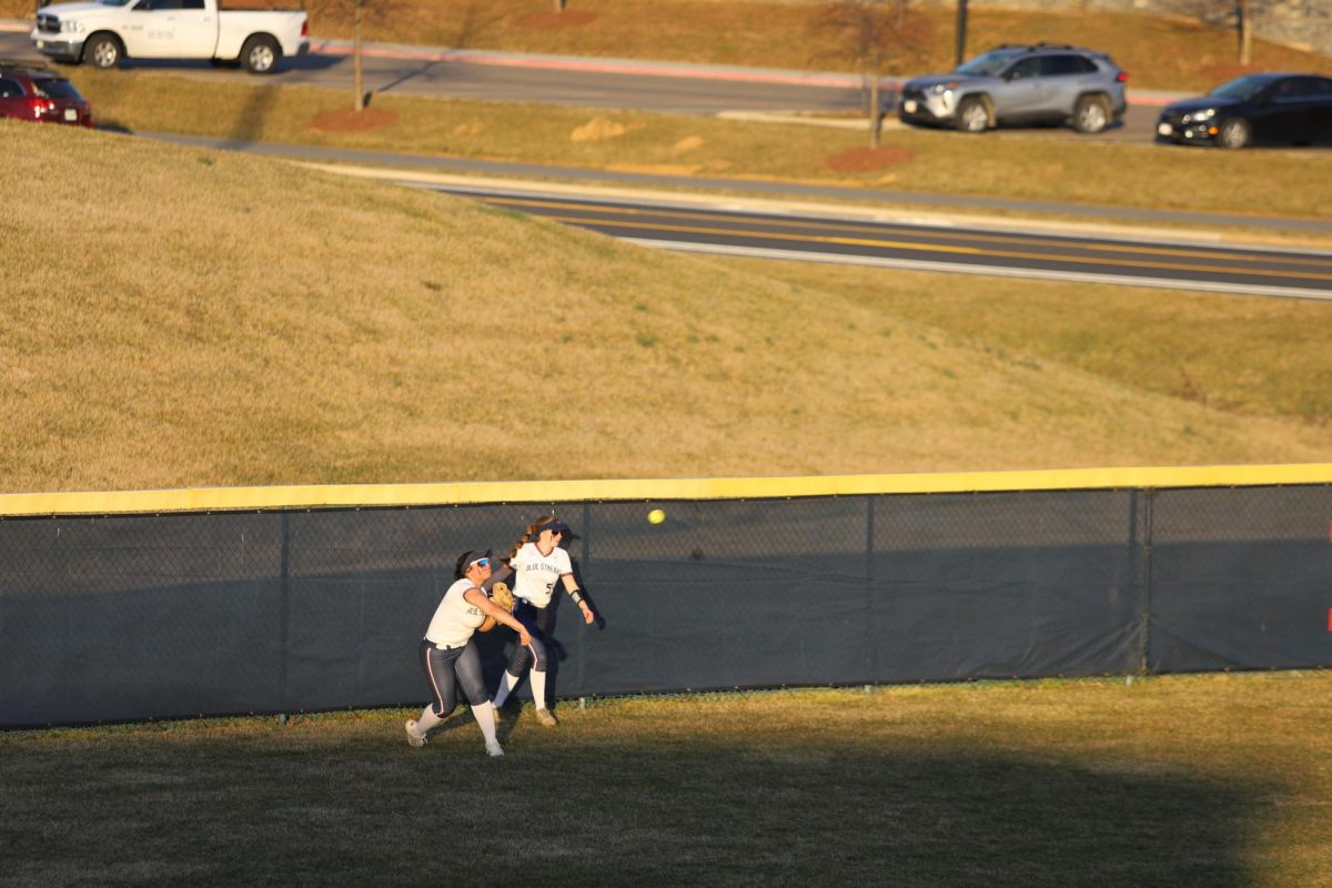 Senior Kayli Alvarado throws the ball from left field. 