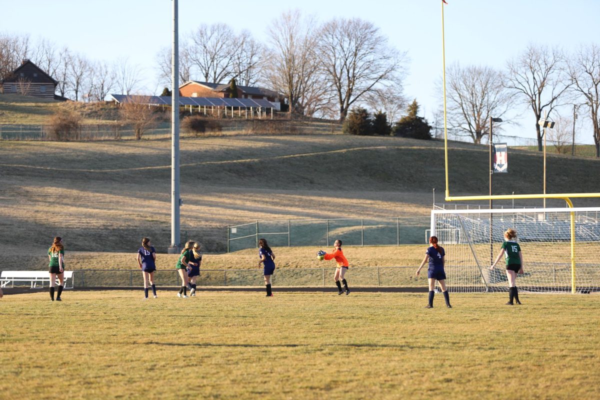 Freshman Lucy Hunter saves a goal. 