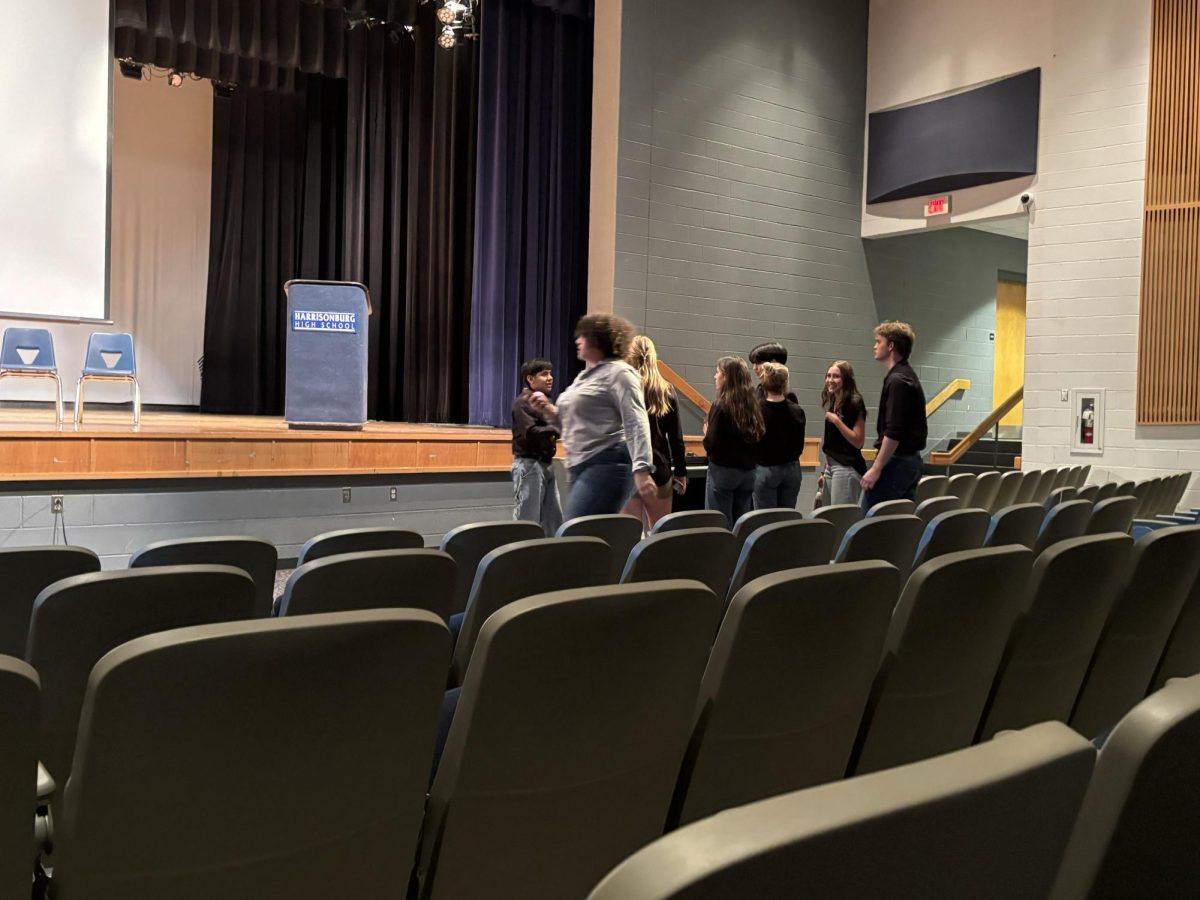 HHS Stem's student board getting ready to get up on stage.