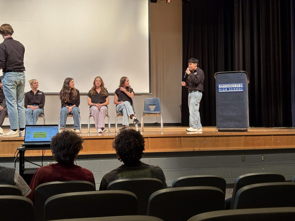 HHS STEM President Giovanni Sanchez Garcia explaining what will be presented.