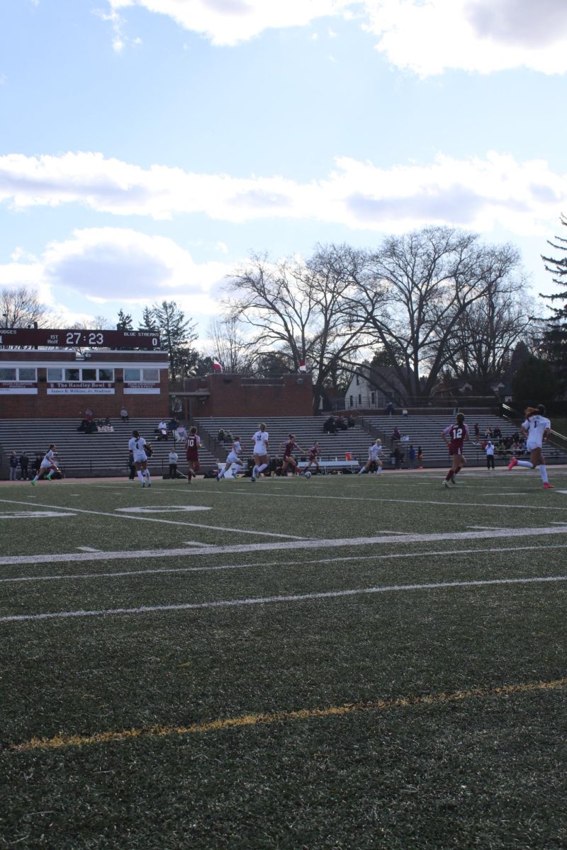 Girls running after the ball
