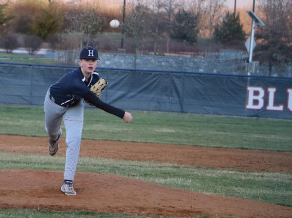 Eighth grader Andrew Noll pitches
