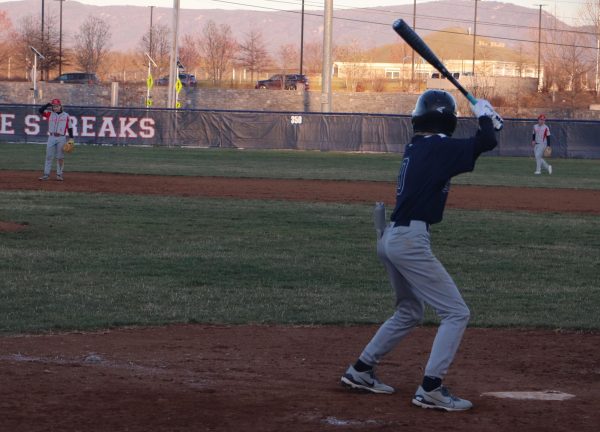 Eighth grader Rylan Smith bats
