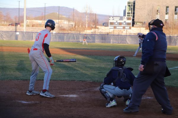 Eighth grader Xavier Perry gets ready to catch the ball