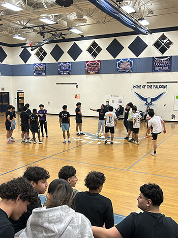 Rocktown and Harrisonburg high teams gather on the court