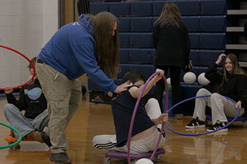 Sophomore's Skylar Scott and Luke Snider are trying to get all the balls before the other teams do.